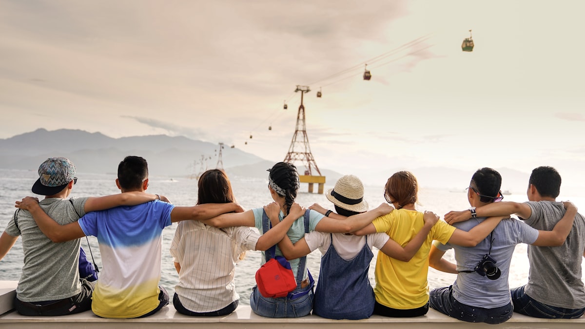 A group of friends together by the sea